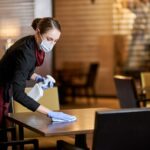 Dutiful restaurant staff being responsible about cleaning and sanitation