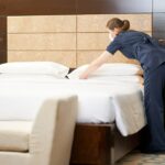 professional-chambermaid-cleaning-a-luxury-hotel-room.jpg