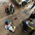 top-view-of-cleaning-company-team-cleaning-modern-office-1.jpg