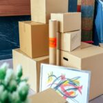 Stacked moving boxes and plant